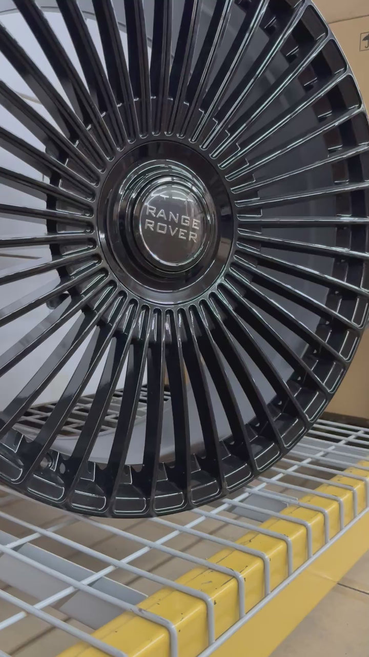 24" SLNG1 Gloss Black XL floating caps. 5x120/5x127